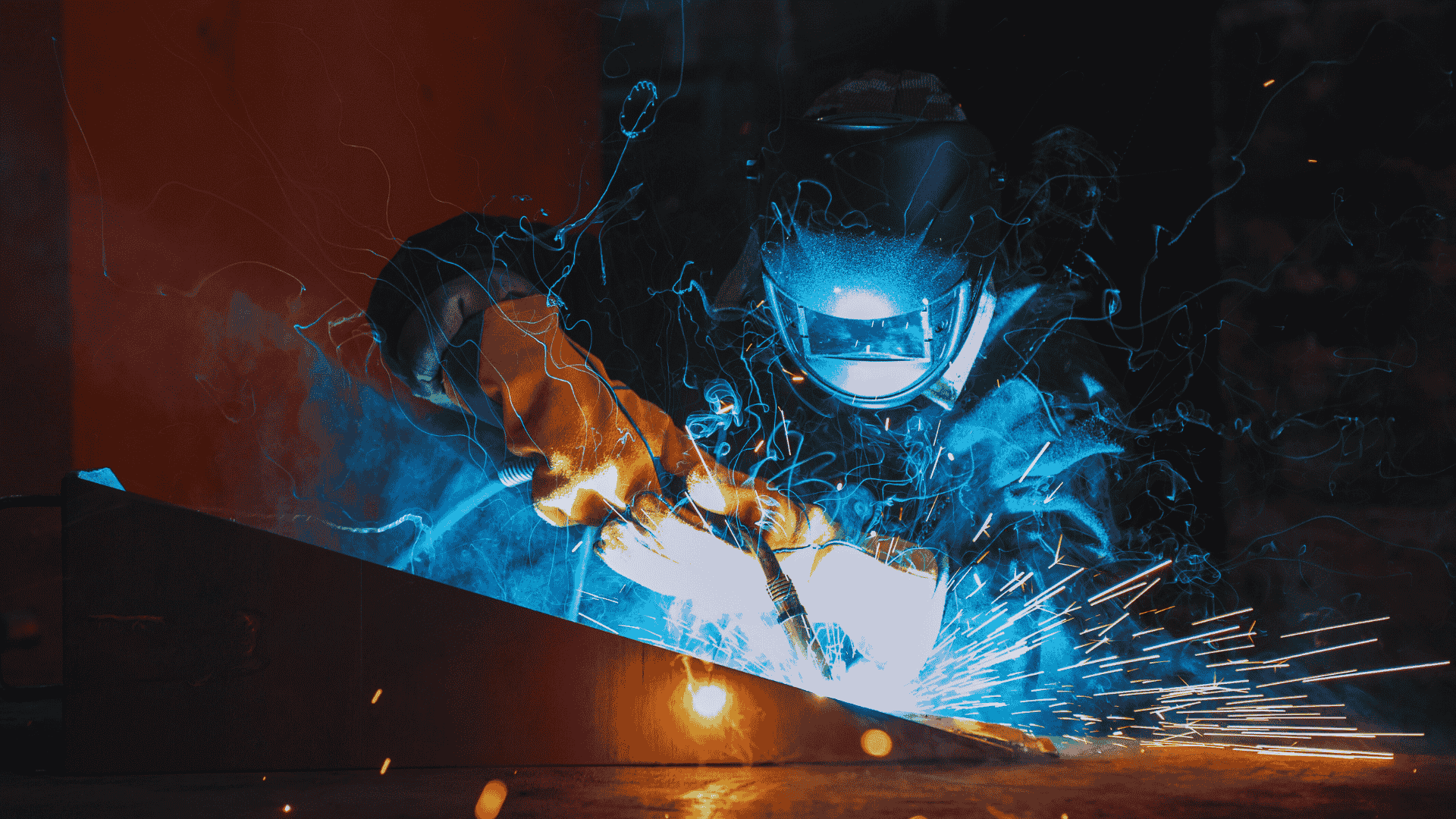 Custom Railing Welding – Proshield Metal Works Welder working on a custom railing project at Proshield Metal Works in Edmonton, using high-quality steel and aluminum.